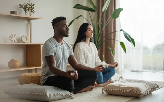 Parents practicing mental health tips for parents through meditation and relaxation