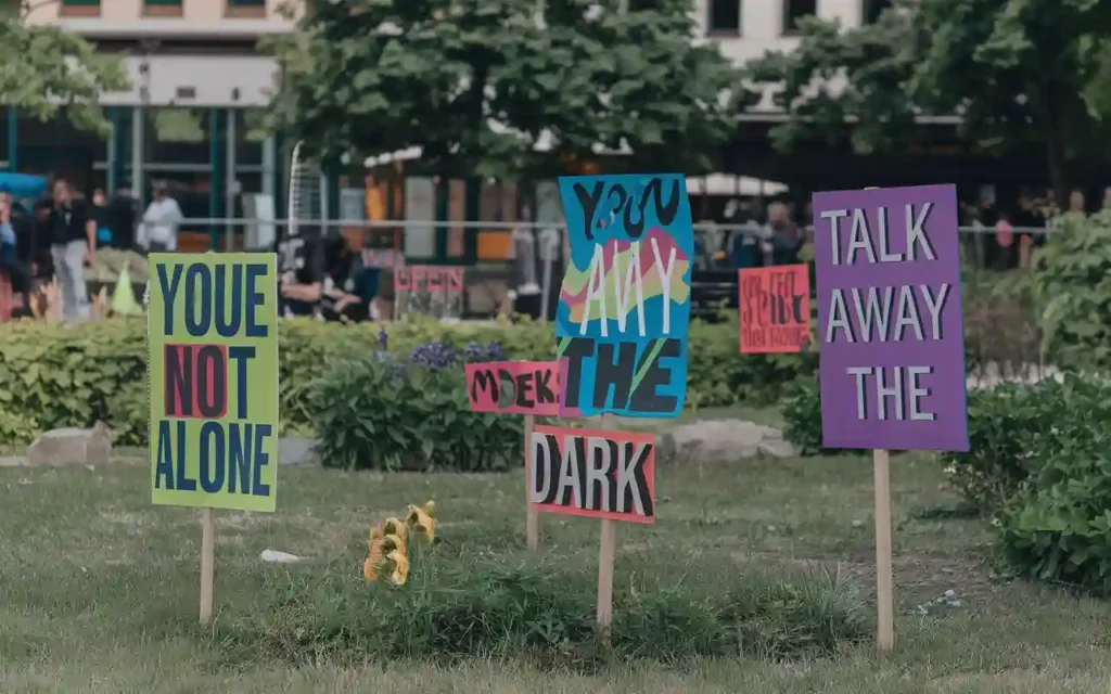 A banner showing various suicide prevention slogans raising awareness.