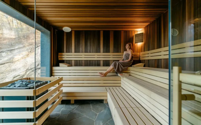 Sauna weight loss journey with person enjoying sauna session