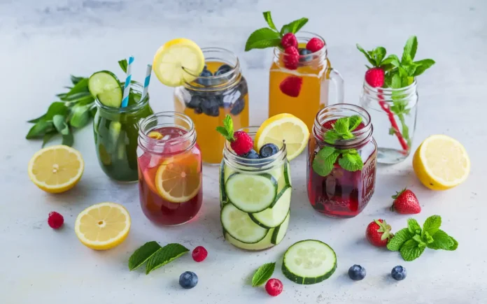 Homemade weight loss drinks with fresh fruits and herbs