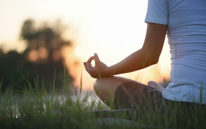 21 days of fasting and prayer - person meditating in peaceful environment