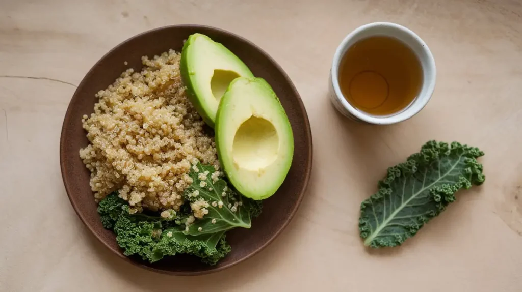 A plate of whole grains, avocado, fresh greens, and herbal tea as part of the ayahuasca diet