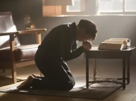 A serene image of a person praying with an open Bible, symbolizing fasting and prayer scriptures for breakthrough.