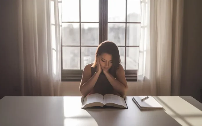 A serene person praying and fasting with scriptures for financial breakthrough