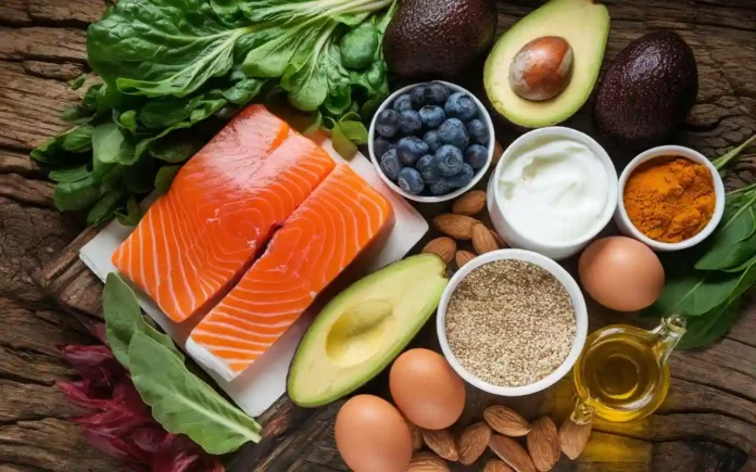 A colorful display of the top 10 foods from Gary Brecka's diet food list, arranged on a rustic wooden table