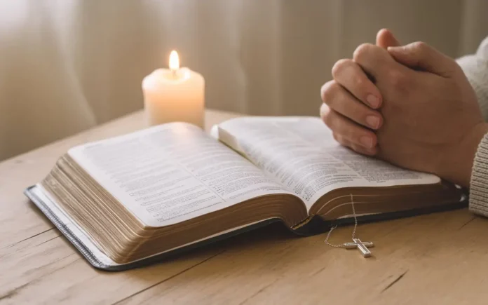 An open Bible with prayer hands, symbolizing types of Christian fasting.